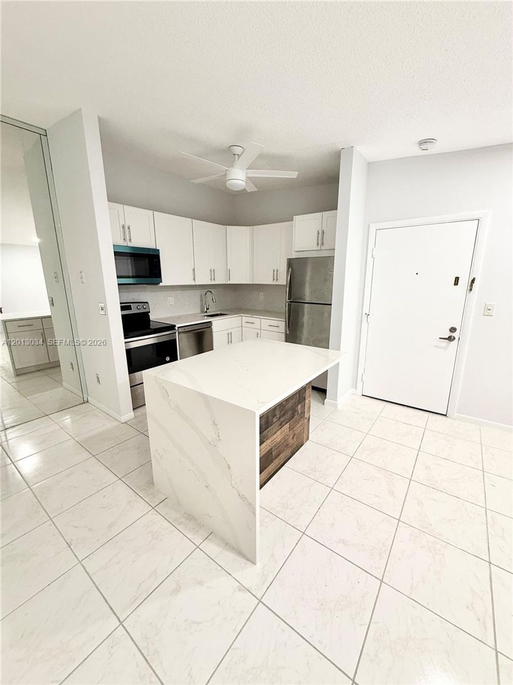 Photo of 7857 Ashmont Cir #213, Tamarac, FL 33321 (MLS # A12013034)