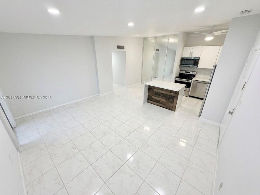 Step inside to your new home, this beautifully renovated top floor corner unit hosts 2-bedroom & 1-bath nestled in this friendly community of Ashmont! The private elevator adds major convenience making going up and down an ease. King's Point offers convenient transportation services to medical facilities, pharmacies, shopping, and more! 

Step inside to discover a bright and modern interior featuring waterfall quartz countertops, white shaker cabinets, tile floors and a spa-like bathroom. The spacious bedrooms include wide door ways to provide ample room to move around freely, while the in-unit washer and dryer adds everyday convenience.

Enjoy peaceful pool views directly from your private patio — the perfect spot for morning coffee or unwinding in the evening. Located just steps from the unit, accessibility is effortless. 

Whether you're looking for a seasonal retreat or a full-time residence, this turnkey condo delivers easy, low-maintenance living in a welcoming community.