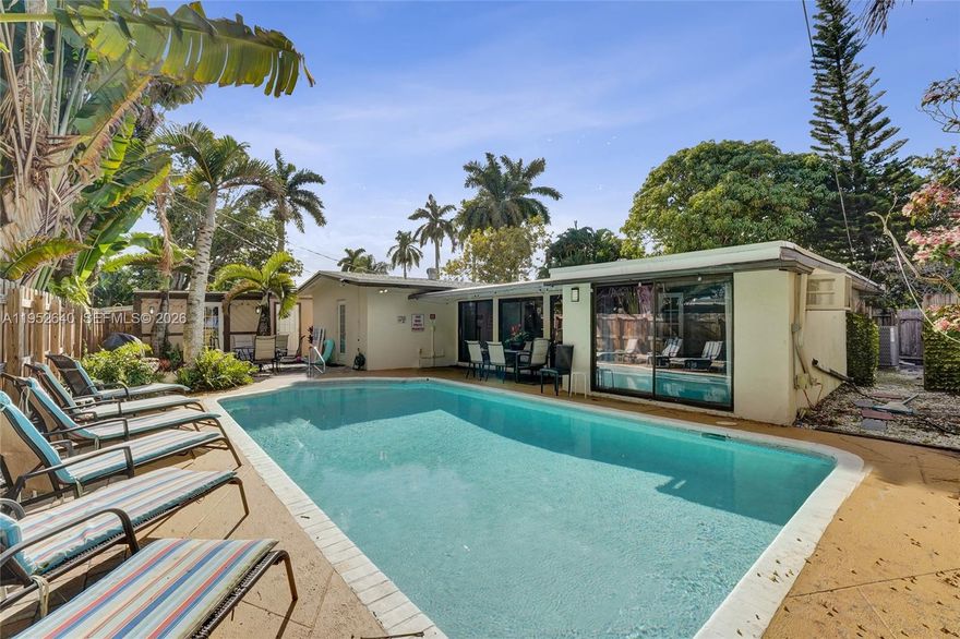 Experience the perfect blend of Florida charm and modern technology in this versatile home, ideal for multi-generational living, a private home office, or rental flexibility. The layout includes a spacious main residence (6BR/3BA) along with a separate guest house (1BR/1BA), offering privacy and functionality under one roof. Marble and tile flooring flow throughout a layout that includes a sunroom overlooking the pool, a formal dining area, and a convenient snack bar, creating a functional and flexible space for everyday living and entertaining.

Centrally located with quick access to I-95, downtown Fort Lauderdale, and local beaches.