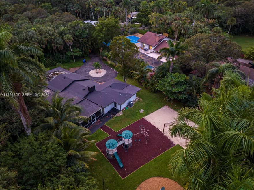 Most homes offer space—this one delivers true privacy, land, and waterfront living in the heart of Fort Lauderdale. Tucked away in the quiet and highly desirable Riverland neighborhood, this 5-bedroom, 4-bath residence sits on an expansive 26,000 sq ft canal-front lot, offering a level of seclusion and tranquility that is incredibly rare this close to the city.
From the moment you arrive, the property feels like a hidden retreat. A private entry and lush landscaping create a sense of complete separation, where the home feels entirely your own. With no close neighbors and a deep lot backing to the canal, the privacy here is unmatched—quiet, peaceful, and surrounded by greenery.
Inside, the home features an open, airy layout filled with natural light, with spacious living areas designed for both comfort and entertaining. The bedrooms are generously sized, offering flexibility for family, guests, or work-from-home setups.
Step outside and the scale of the property truly comes to life. The massive backyard stretches along the canal, offering endless possibilities—whether creating a resort-style pool, outdoor kitchen, lounge areas, or simply enjoying the open space and water views. This is the kind of land and setting that is almost impossible to find in Fort Lauderdale.
Living in Riverland means enjoying larger lots, quiet streets, and a residential feel, all while being just minutes from downtown Fort Lauderdale, beaches, shopping, dining, and major highways.