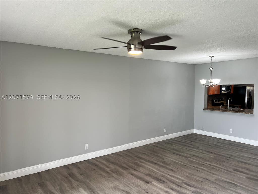 Photo of 10005 Winding Lake Road #105, Sunrise, FL 33351 (MLS # A12071574)