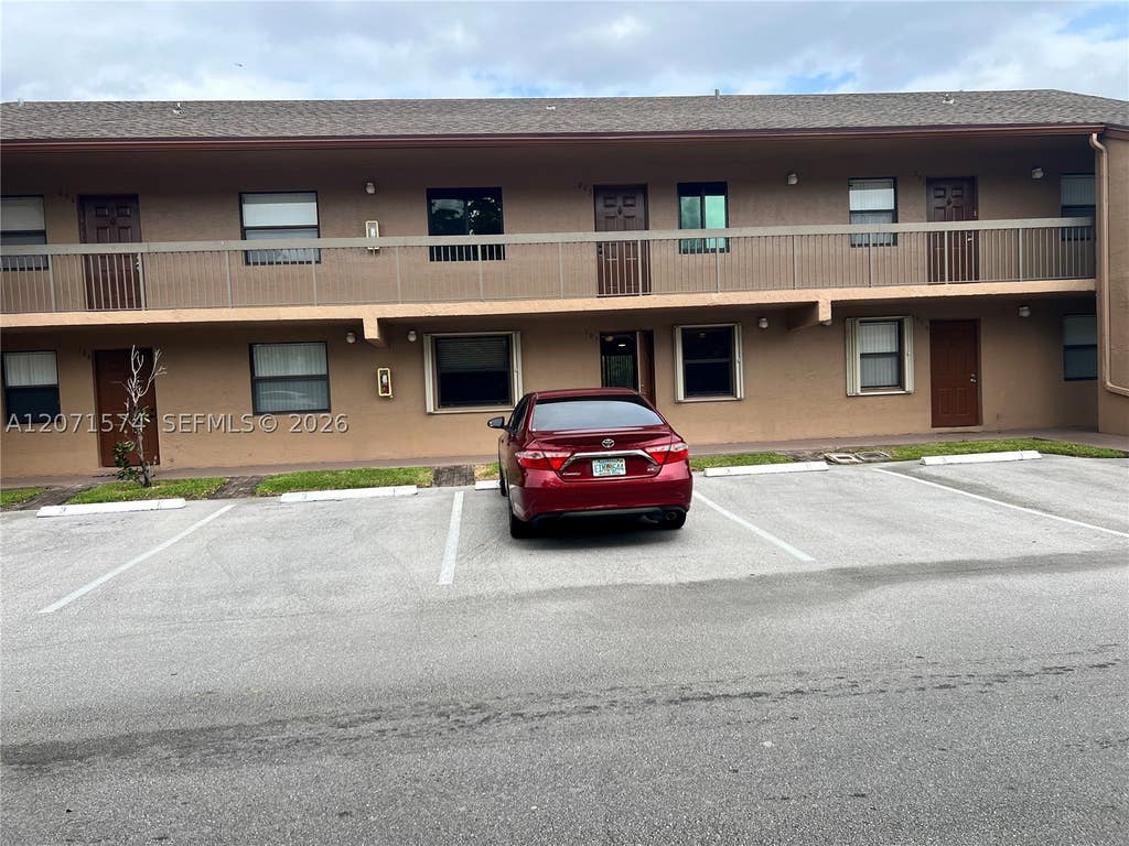 Photo of 10005 Winding Lake Road #105, Sunrise, FL 33351 (MLS # A12071574)
