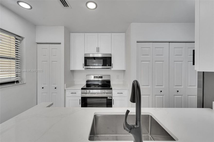 Just gorgeous! 3 Bedroom 2 full bath 2nd floor condo. Completely remodeled and ready! ALL brand new appliances, floors, kitchen cabinets, interior freshly painted. Top location close to everything. If you are looking for a clean, fresh, and great location, do not miss this one. Small pet ok with non refundable deposit.