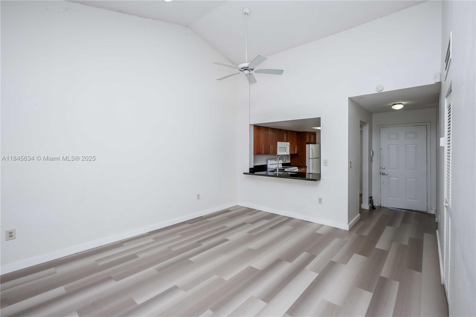 Light & airy 2nd-floor condo with vaulted ceiling and easy-care tile/laminate flooring throughout. Updated kitchen & baths. Granite pass-through breakfast bar opens to the living area for great flow. Directly across from the community playground; short walk to clubhouse & pool. Stroll to Pembroke Lakes Mall and the shops/dining along Pines Blvd. Ready for move-in!