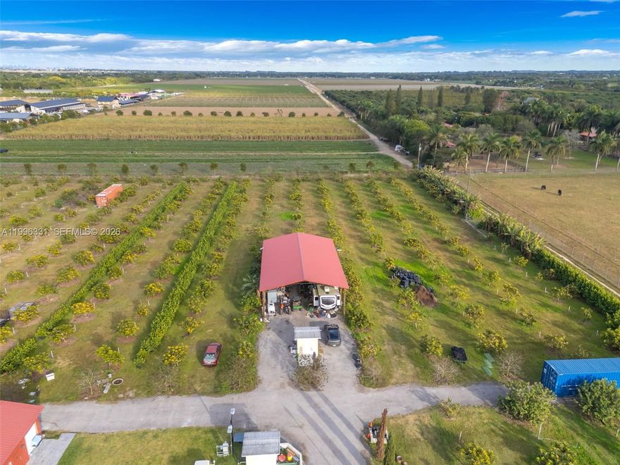 5 ACRE IMMACULATE MAMAY GROVE IN PRISTINE CONDITION. 25-30 FOOT CENTERS.ROOM TO SUB PLANT AS SEEN )TREES ARE ALMOST 5 YEARS OLD..READY FOR FULLL PRODUCTION WITHIN 1-2 YEARS.. LONG LIFE SPAN HERE!!!BOTH VARIETES THE M & KW..THE POLE BARN 25 X 40-45 ML WITH METAL ROOM AND 220 ELEC.(TOUR BUS NOT INC). BUILDABLE SITE. LARGE CHICKEN COOP WITH OVER 30 RHODE ISLAND RED HENS TO REMAIN, ADJ 5 AC TURN KEY VENUE AVAIL..  CLOSE TO KENDALL NEAR NEW KNAUSS BERRY FARM ...THE CINNAMON  ROLL OUTFIT ON KROME AND 168. CALL FOR APPT. NOTHING IS CARVED IN STONE. REASONABLE. LOCATION IS EXCELLENT. LOW TAXES 212.00 A YEAR...