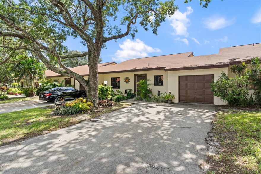 WELCOME HOME! This move-in-ready villa in Margate has 2 spacious bedrooms and 2 bathrooms with additional den space for a possible third bedroom! Enjoy peace of mind with a new roof, new A/C system (one month old), new water heater and hurricane impact windows and doors throughout the home. The kitchen features new stainless steel appliances as well. The unit offers ample natural light and a private patio with new turf, ideal for relaxing, outdoor dining or hosting guests year-round. You can also enjoy the community pool, clubhouse and walking path for more fun in the sun! Whether you're looking for a full-time residence or a seasonal retreat, this villa offers a perfect blend of comfort, convenience, and security in a well-maintained community. Don't miss out!