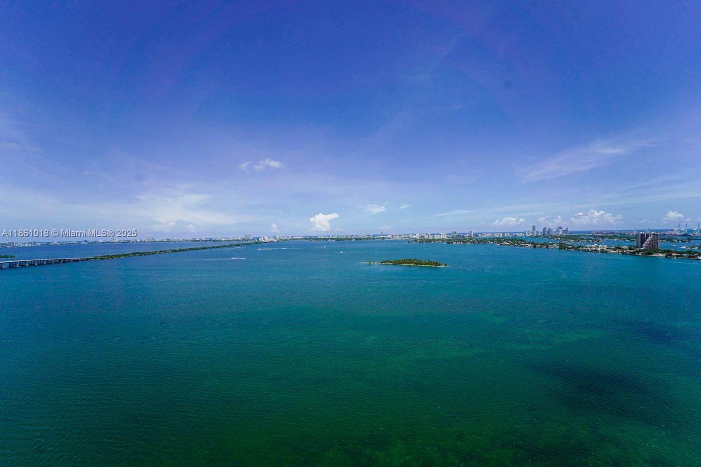 Discover refined waterfront living in this brand-new 1BR+Den, 2BA residence on the 29th floor of Aria Reserve. Enjoy panoramic views of Biscayne Bay, the Intracoastal, Miami skylines & the Atlantic Ocean from the spacious balcony accessed from both the Living RM & primary suite. Featuring tile flrs throughout, a sleek white kitchen w/ Thermador appliances & Quartz waterfall island, floor-to-ceiling glass windows that flood the space w/natural light. The den offers flexibility as a home office or guest room. Residents enjoy 2+ acres of luxury amenities: bayfront & rooftop pools, spa, fitness & wellness center, business center w/ a conference room, theater, multiple lounges, game room, BBQ areas, kids' play zones & 24/7 concierge. Minutes to Design District, Wynwood, Downtown & Miami Beach.