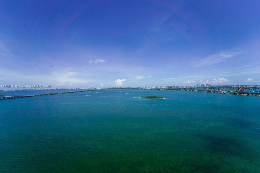 Discover refined waterfront living in this brand-new 1BR+Den, 2BA residence on the 29th floor of Aria Reserve. Enjoy panoramic views of Biscayne Bay, the Intracoastal, Miami skylines & the Atlantic Ocean from the spacious balcony accessed from both the Living RM & primary suite. Featuring tile flrs, custom built-ins in Master walk in closet,a sleek white kitchen w/ Thermador appliances &Quartz waterfall island, floor-to-ceiling glass windows that flood the space w/natural light & black out shades. The den offers flexibility as an office or guest rm. Enjoy bayfront & rooftop pools, spa, fitness &wellness center, business center w/a conference room, theater, multiple lounges, game room, BBQ areas, kids' play zones & 24/7 concierge. Minutes to Design District, Wynwood, Downtown & Miami Beach.