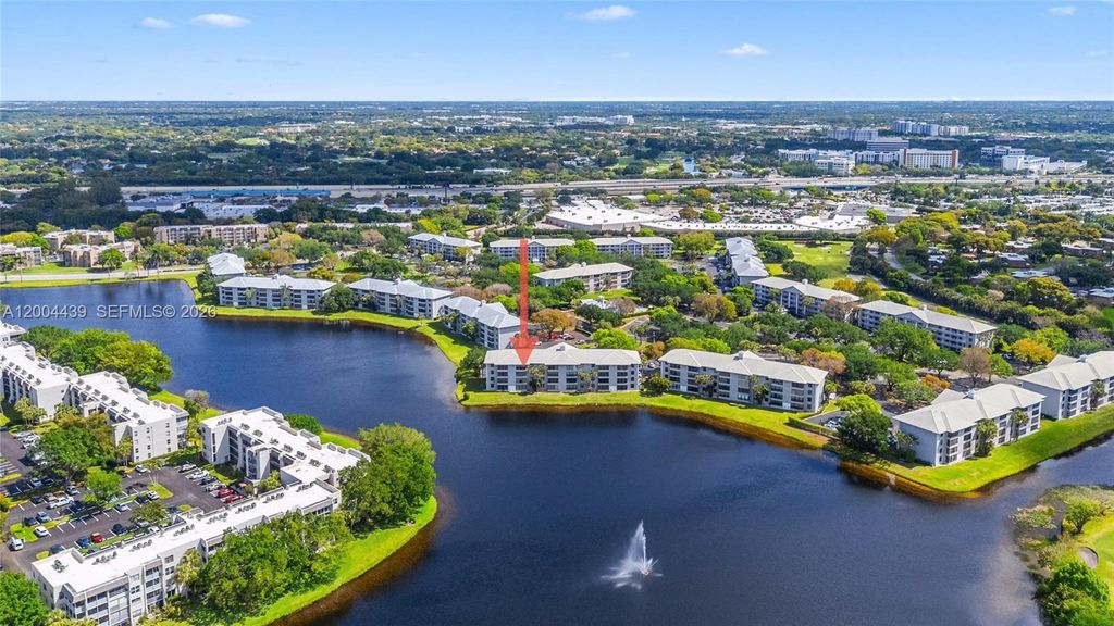 Photo of 1524 Whitehall Dr #405, Davie, FL 33324 (MLS # A12004439)
