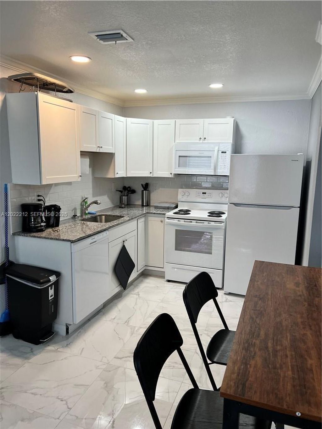 Photo of 2240 Simms St, Hollywood, FL 33020 (MLS # A12022212)