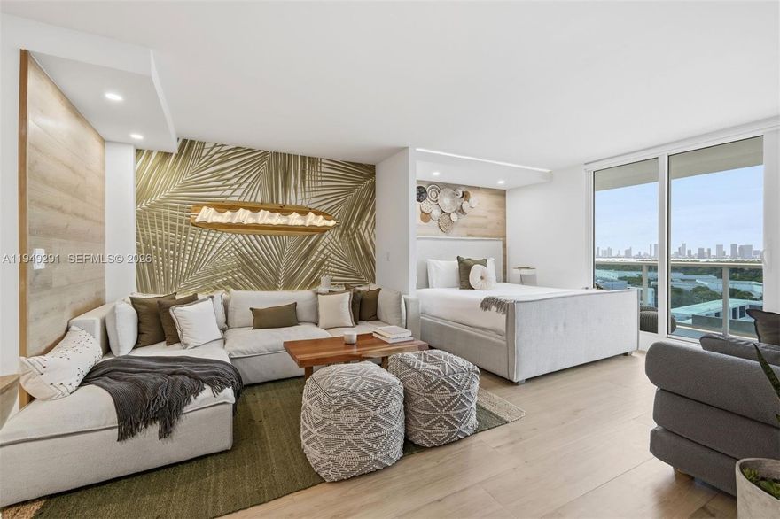 One-of-a-kind, high-floor, custom renovated residence with unobstructed panoramic views of Downtown Miami, Miami Beach, Biscayne Bay, and nightly sunset skies. Designed to be lived in, this spacious studio with BALCONY has been reimagined to maximize comfort, style, and functionality. Features include a large walk-in closet, custom floating desk, Samsung washer and dryer, Samsung AirDresser (steamer and sanitizer), designer kitchen with waterfall quartz eat-in island seating for four, Samsung appliances, and a generous living area for relaxing and entertaining. The only studio lines with downtown-facing balconies are the highly sought-after 29 and 30 lines.
Wake up to ocean air, watch glowing sunsets from your balcony, and enjoy true beachfront resort living with 5-star amenities including four resort style pools & cabanas, Anatomy Fitness, Bamford Spa, Tala Beach Club, and over six world-class restaurants and bars. Residents enjoy full access and preferred pricing.
Flexible 30-day rental policy allows owners to generate income when not in residence. 
Offered fully furnished with custom pieces and new appliances. HOA includes AC, water, cable, and WiFi. A turnkey opportunity to own one of the most desirable studios in one of Miami Beach’s most iconic oceanfront resorts.