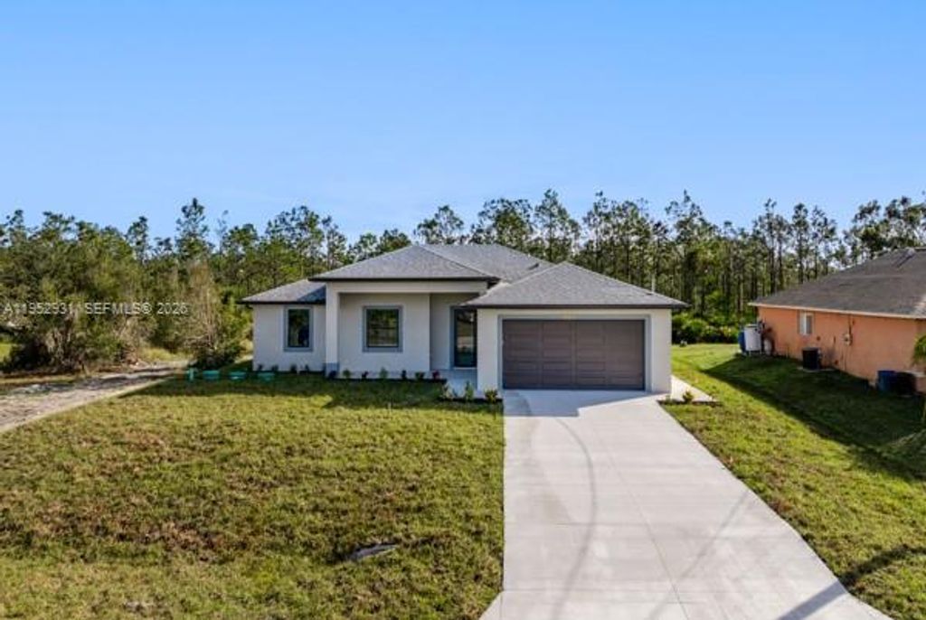 Photo of 1024 Chauncey Ave, Lehigh Acres, FL 33971 (MLS # A11952931)