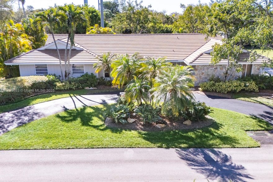 Rare opportunity at this price point to own a wonderful family home on .7125 acre (31,037 sqft) on a beautiful quiet no-traffic street in North Palmetto Bay steps from Coral Reef Park.  Beautifully maintained and updated 4 BR/2.5 Bth on private park-like acreage.  2018 flat tile roof, wood and porcelain floors, fireplace, gorgeous wood cabinets and built-ins, French doors, SS appliances, indoor laundry room and more!  Large and spacious screened-in pool/patio and incredible lush and private outdoor space.  2 separate folio numbers being sold together. Folio numbers are: 33-5023-028-0010 & 33-5023-023-0320. Call listing agents for details please.