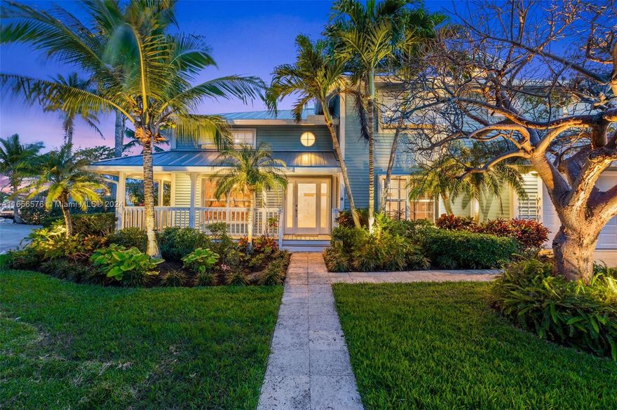 Stunning Key West style residence nestled along the tranquil waters of central Palm Beach County. Boasting 130 feet of waterfront & situated on a sprawling 1/3-acre lot, this home offers an unparalleled opportunity to embrace the ultimate coastal lifestyle.