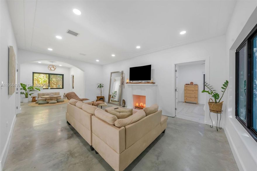 Attention Designers! Turnkey modern 3BD/2BA offering seamless live-work living just one home off the Morningside gate—providing direct access to the 40-acre waterfront park, boat ramp, tennis courts & green space. Enjoy the Morningside lifestyle and neighborhood synergy at nearly half the price of being inside the gate. Located on a quiet dead-end street with direct access to Biscayne Blvd and directly across from prestigious Cushman School.

Substantially renovated from 2023–2026, this one-story residence features a bright, open layout with polished concrete & tile floors, working fireplace, dimmable recessed LED lighting & oversized kitchen with smart appliances. Spa-style wet room baths include walk-in showers, and the spacious primary suite is designed for both comfort and function.

Set on an oversized 8,200 SF fully fenced lot with room for a pool & hot tub. Includes 4–5 parking spaces, 1-car A/C garage & storage shed. Major updates include new roof (2023), new A/C, new plumbing, new electrical, hurricane-impact windows & doors, resurfaced walls & structural improvements. Currently zoned residential, with potential for future rezoning to commercial use (buyer to verify). Minutes to Miami Beach, Design District & Downtown. NO TRESPASSING!