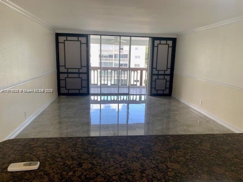 Photo of 901 NE 14th Ave #407, Hallandale Beach, FL 33009 (MLS # A11879035)