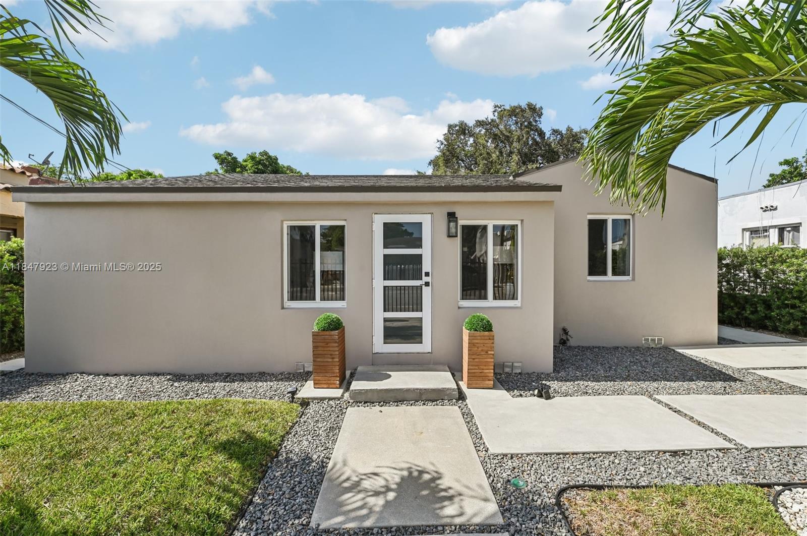 Beautifully remodeled 3-bedroom, 2-bath home in central Miami, perfect for first-time buyers or investors. This move-in ready property features a brand-new roof, updated kitchen with granite countertops, all appliances in the kitchen are Kitchen Aid brand, remodeled bathrooms, and waterproof vinyl flooring throughout. Enjoy peace of mind with a new tankless water heater, modern lighting ,impact windows, doors, and fresh interior and exterior paint. The spacious backyard offers endless possibilities ideal for entertaining, adding a pool, or create your dream outdoor space. There is also room to add an ADU. Centrally located just minutes from I-95, Midtown, Wynwood, and Miami International Airport. A must-see home in a rapidly growing area!