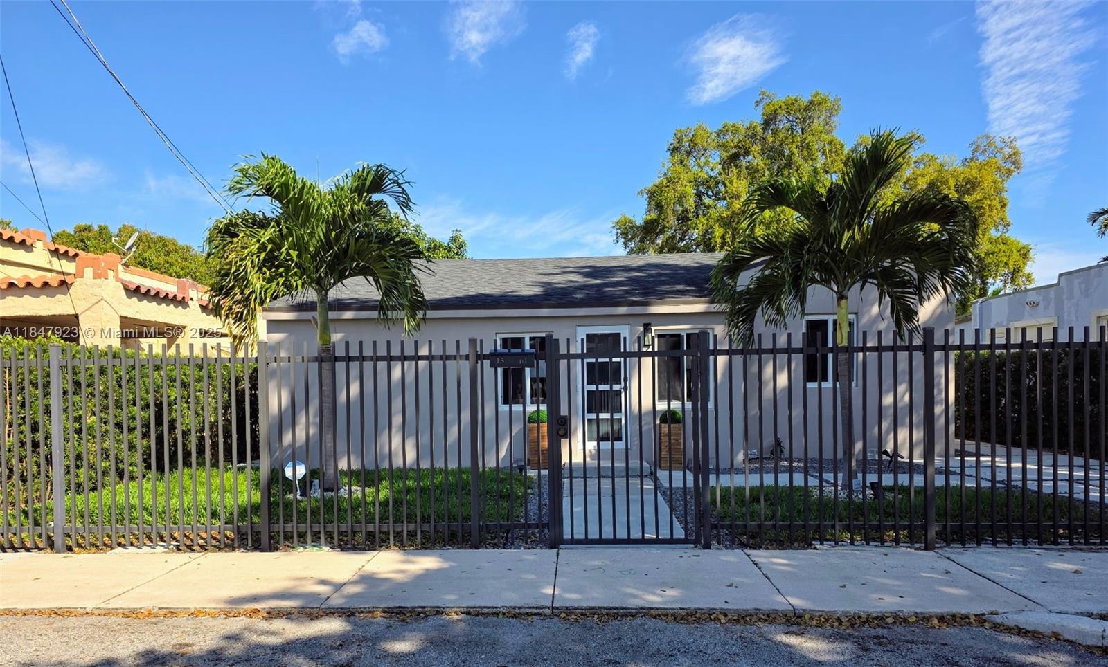 Beautifully remodeled 3-bedroom, 2-bath home in central Miami, perfect for first-time buyers or investors. This move-in ready property features a brand-new roof, updated kitchen with granite countertops, all appliances in the kitchen are Kitchen Aid brand, remodeled bathrooms, and waterproof vinyl flooring throughout. Enjoy peace of mind with a new tankless water heater, modern lighting ,impact windows, doors, and fresh interior and exterior paint. The spacious backyard offers endless possibilities ideal for entertaining, adding a pool, or create your dream outdoor space. There is also room to add an ADU. Centrally located just minutes from I-95, Midtown, Wynwood, and Miami International Airport. A must-see home in a rapidly growing area!