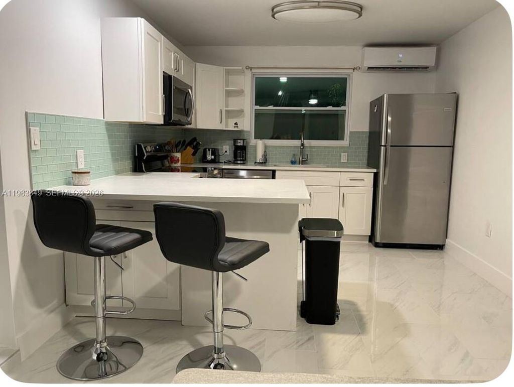 Photo of 1432 NE 5th Ave #2, Fort Lauderdale, FL 33304 (MLS # A11983849)