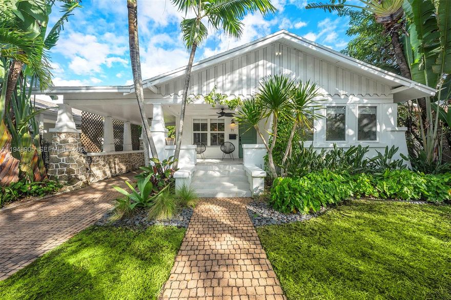 Don’t miss this rare Old Florida bungalow-style home—an original Sears & Roebuck model—nestled in coveted East Buena Vista just blocks from Miami’s Design District. Thoughtfully remodeled and reconfigured in 2018 and 2024, the home preserves its historic character while offering modern comfort. The main residence features 3 beds and 2.5 baths, complemented by a private cottage with living room, kitchen, bedroom and full bath—ideal for guests or a home office. Outdoors, enjoy a newly designed backyard with heated pool, covered pergola with built-in summer kitchen and a turfed side yard, perfect for entertaining. Additional highlights include impact windows and doors, decorative fireplace, hardwood floors, open-concept living, remodeled kitchen with gas range, custom closets, covered front porch, 1-car carport w/ 240 outlet for EV charger and basement with plenty of storage. 2020 Roof and all updated PVC plumbing. Prime location near top restaurants & luxury shops in Design District, Midtown, Wynwood, Miami Beach, I-95 and major airports.