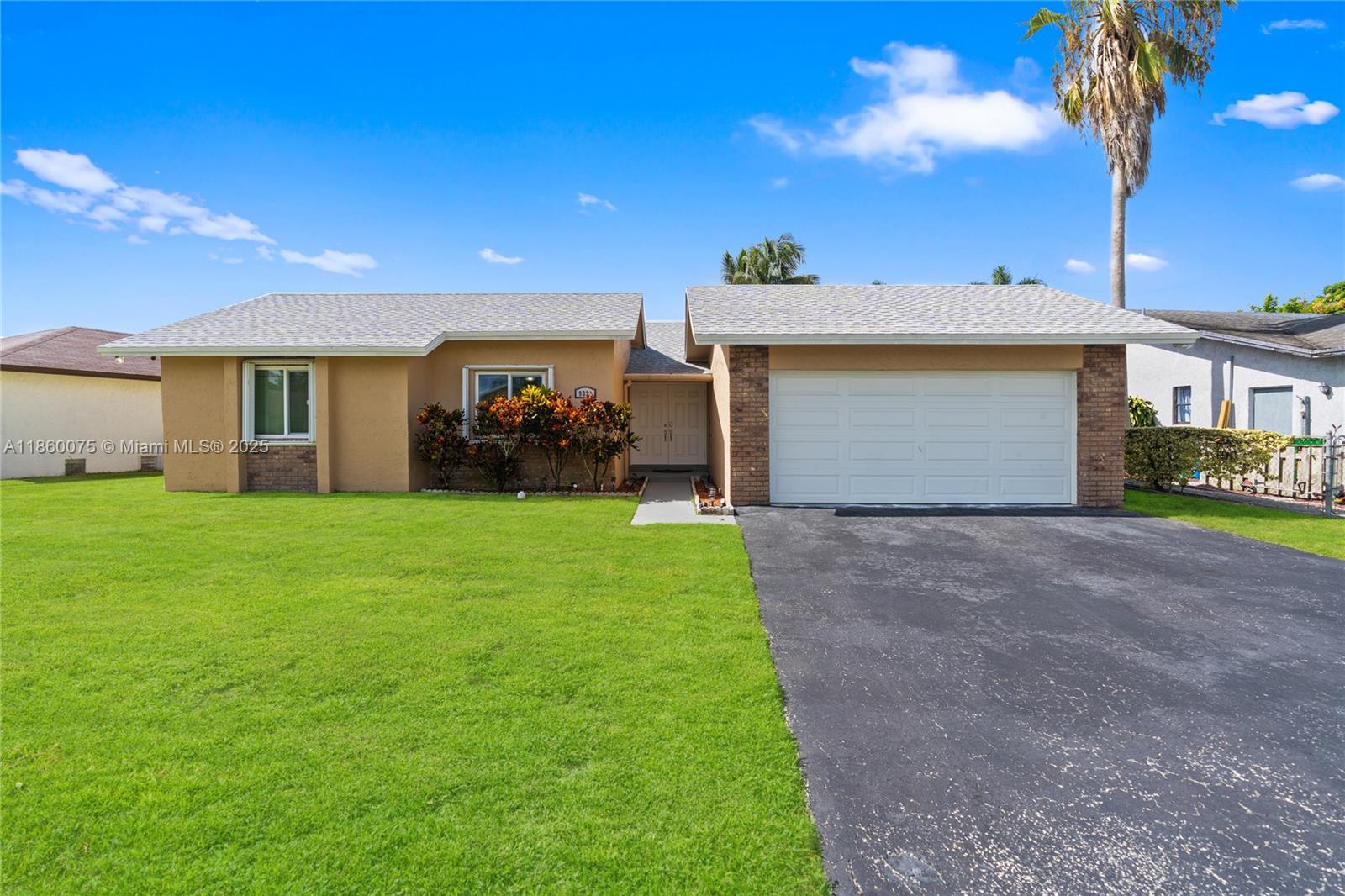 SPACIOUS 3 BEDROOM 2 BATHROOM HOME WITH A 2-CAR GARAGE LOCATED IN A VERY DESIREABLE AREA! THIS BEAUTIFUL HOME FEATURES A FULLY UPDATED INTERIOR WITH A NEW A/C UNIT, NEW KITCHEN CABINETS, NEW GRANITE COUNTERTOPS, ALL NEW APPLIANCES, NEW TOP OF THE LINE WASHER / DRYER, NEW LED LIGHTS, AND NEW FLOORING THROUGHOUT. THE EXTERIOR FEATURES A LARGE SCREENED POOL WITH PLENTY OF SPACE TO ENTERTAIN, A NEW ROOF, ACCORDIAN SHUTTERS AND NEW HURRICANE IMPACT WINDOWS.