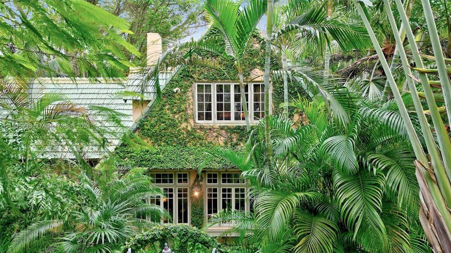 Rare Upper Eastside-Magnolia Park Estate. Historically designated French Vernacular European Country home nestled amid spectacular private gardens. This unique property offers modern convenience and charming original details including high ceilings, fireplace and French Doors throughout. There is a view from every window and door of the expansive and exceptionally maintained gardens with fountains, seating areas and a fenced dog park. Room for pool. Electronic gates open to off street parking. Irrigation system, Whole Home generator. 2 Zone Central A/C. NOT located in a flood zone!
Located steps from waterfront park. Design District,  MiMo, Edgewater, Wynwood shops and dining all within walking distance. This is a one of a kind property!