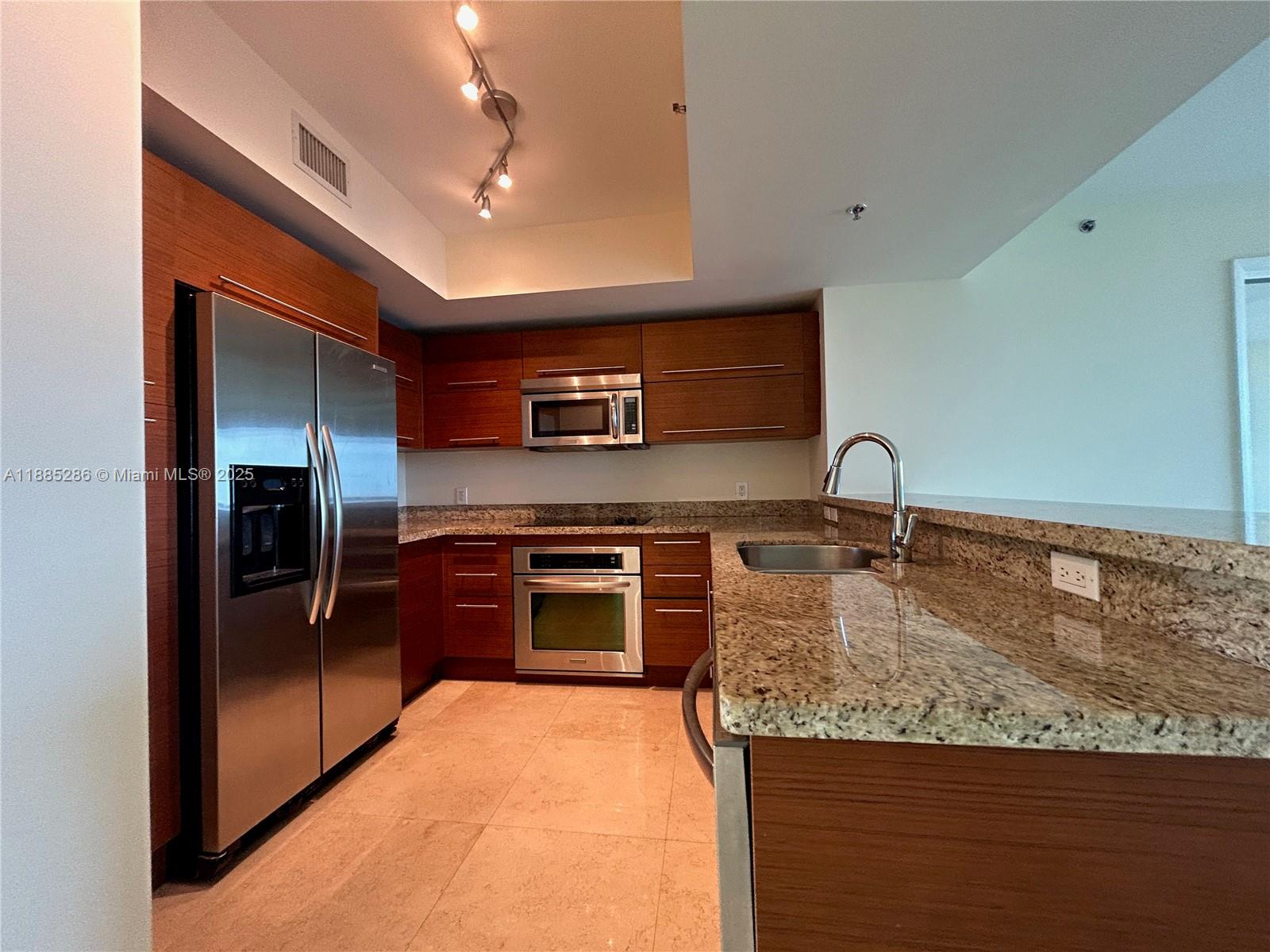 TAO SAWGRASS CONDOMINIUM - Residential Lease