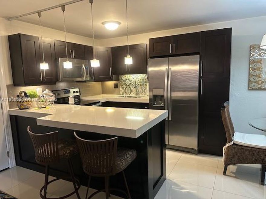 Completely renovated, window treatments , custom closet new a/c great community walking distance to shops and cafes ,Condo has with court yard patio on the first floor, move in ready clean and manicured. Kitchen has new appliances, custom wood cabinets and quartz counter tops.