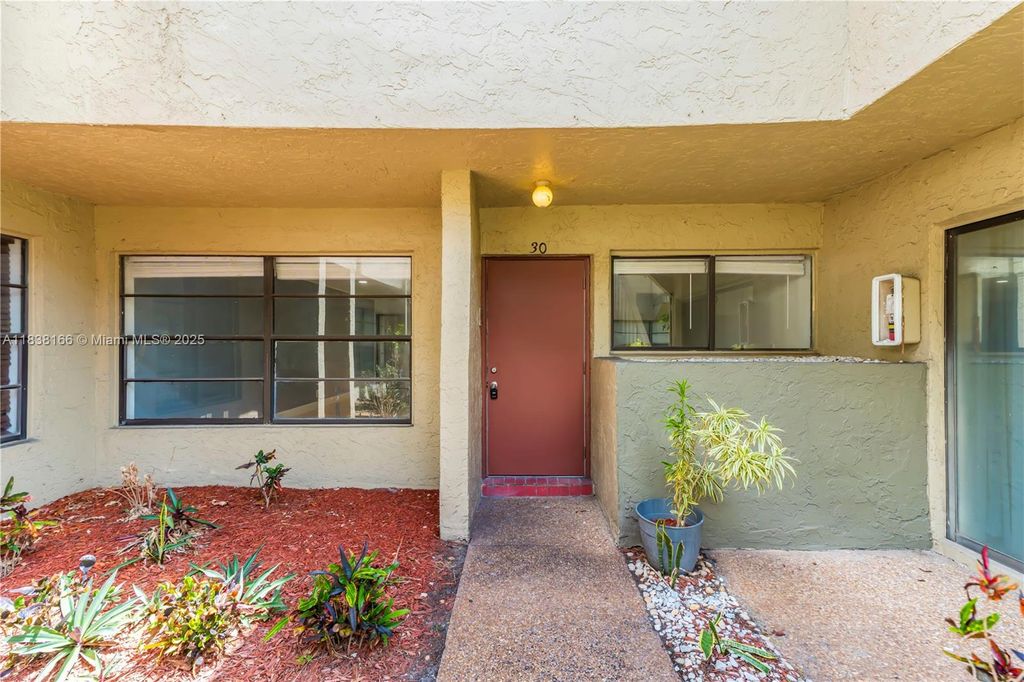 Photo of 2530 Coral Springs Dr #2530, Coral Springs, FL 33065 (MLS # A11838166)