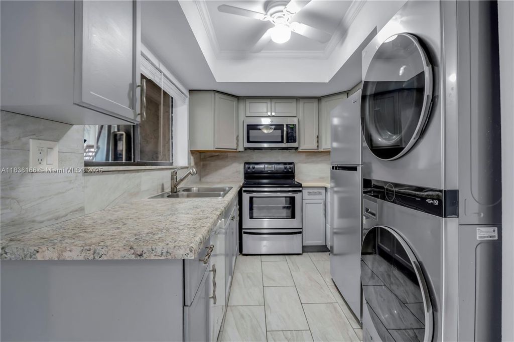 Photo of 2530 Coral Springs Dr #2530, Coral Springs, FL 33065 (MLS # A11838166)