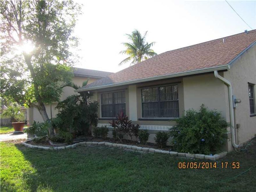 4/2 Located in Palmetto Bay, Miami bedroom community. Very spacious with wide doorways. Split plan with Master suite. Large kitchen & great room to suit many uses. Privacy wall and gate. 24/7 On Demand 18 kw generator. All permits closed.