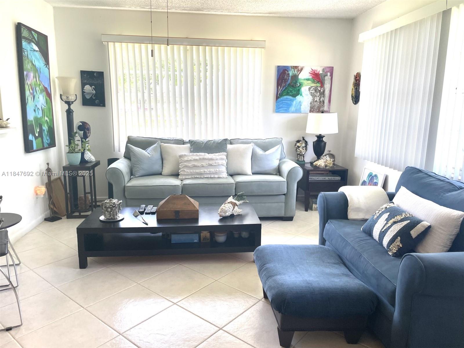 Desirable 1st floor property in a vibrant resort-style community ! this 1 bedroom, 1 1/2 bathroom, move-in ready is waiting for you. Stainless steel kitchen appliances, central air conditioning equipment, ceramic tile throughout, kitchen ceiling recessed lighting , a gorgeous right out-front door peaceful canal view surrounded by luscious tree and green area are just a few things that will make you say yes to the property! The community amenities are countless, and the location of this property is near to everything you need to go to, even to the beach ! Low maintenance fee, and no special assessments as of now. This is a rentable building. 12 mo. waiting period to rent. Contact me to schedule a private tour.