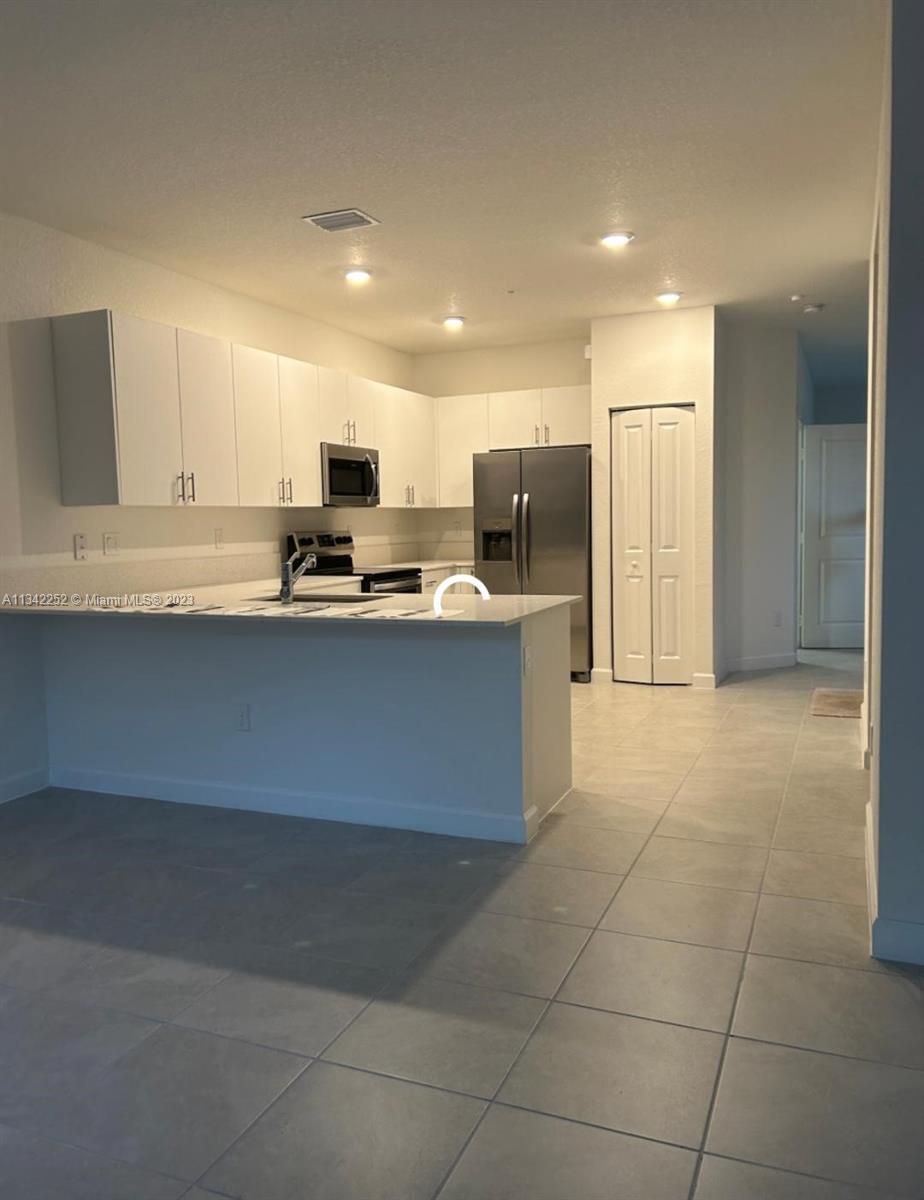 Photo 12 of 23 of 203 SW 159th Ter townhome