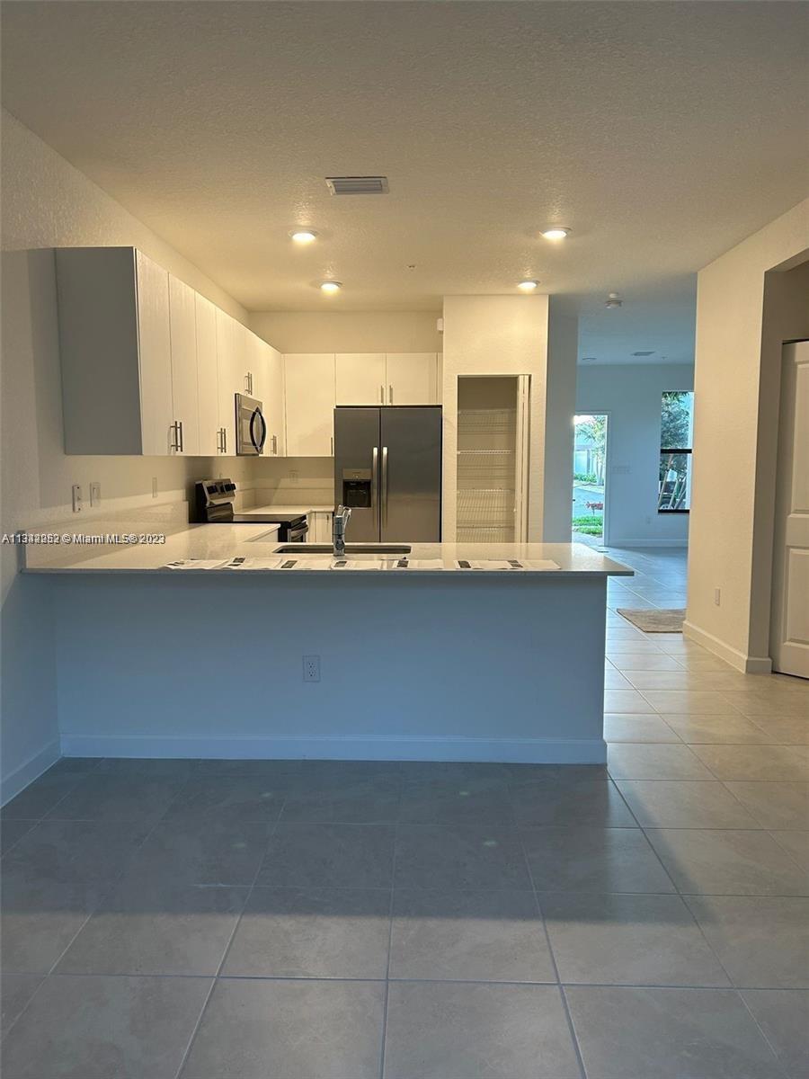 Photo 5 of 23 of 203 SW 159th Ter townhome