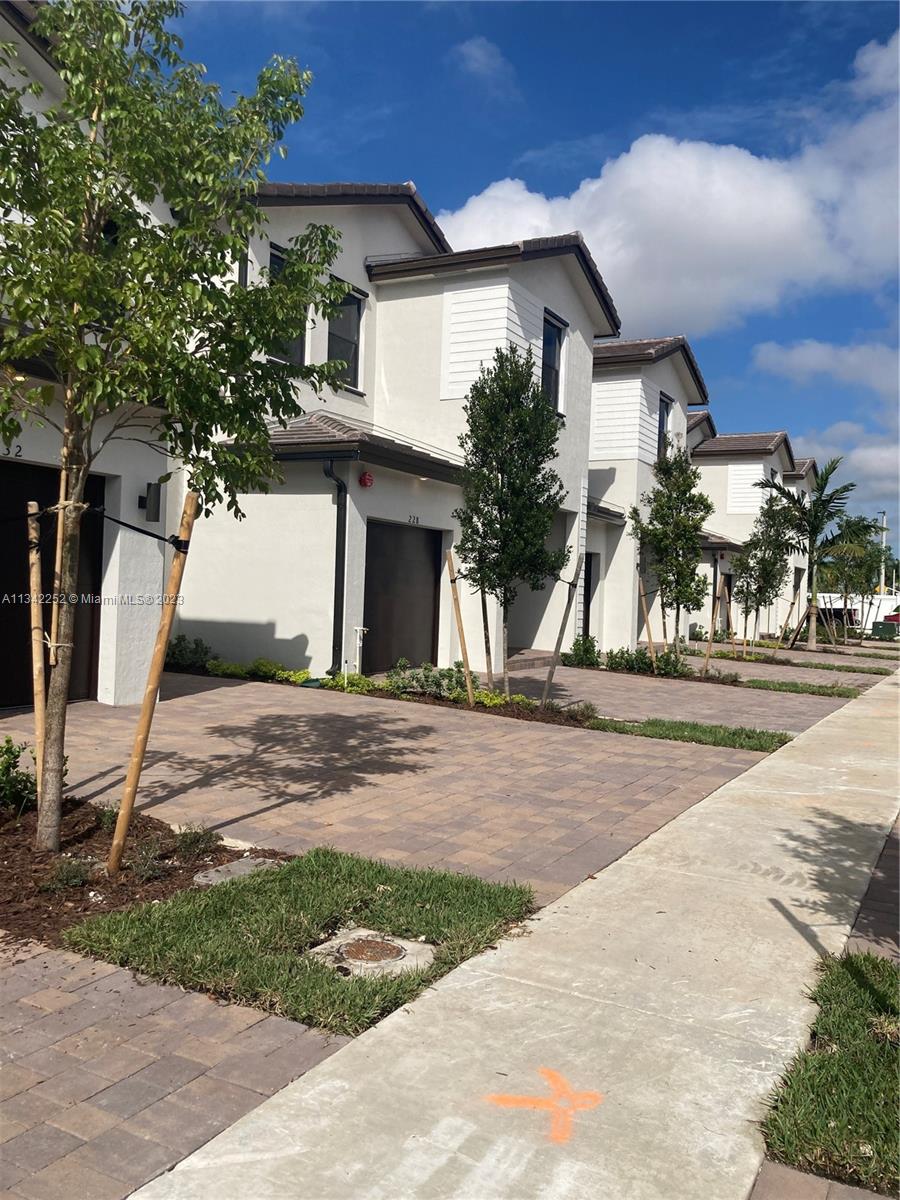 Photo 1 of 23 of 203 SW 159th Ter townhome