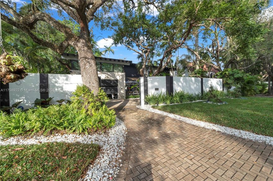 Stunning luxury home in the heat of Coconut Grove! This fully renovated residence offers a seamless blend of modern elegance and tropical charm. The property boasts a brand new updated garage under air. Current owner utilizes this space as a gym. Featuring spacious living areas, high-end finishes, and a gourmet kitchen layout, this home is perfect for those seeking comfort and style. The backyard area is a true show stopper, an incredible deck with a jacuzzi, creates the ultimate private oasis for relaxation and entertaining or enjoy the fire pit for an evening under the stars! Schedule your showing today and witness a new level of Groveite Luxury!