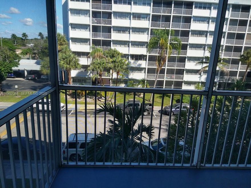 UPDATED 2 BR/ 2 BA condo located in the gated community of Ellington at County Line II! This 1,162 sq ft unit loasts natural lighting throughout the split bedroom floor plan. The unit features a private kitchen off the dining/living room combo and ample storage space. The master bedroom includes a master bath with dual vanities and shower/tub combo. Located just 15 minutes to the Hard Rock Stadium, dining, shopping and more!Great as a home and easy to rent for investors.Basketball Courts, Exercise Room, Pool. ASSOCIATION HAS RESERVES