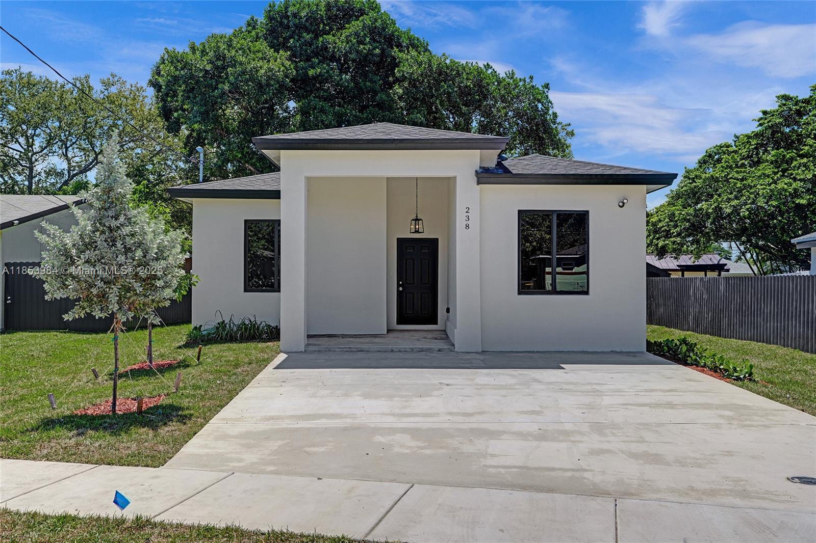 Come take a look at this BRAND NEW 2025 Construction home! This beautifully designed home offers 4 bedrooms, 3 full bathrooms, a covered front entry, impact windows, porcelain flooring throughout and all new appliances. The open concept kitchen spilling into the living and dining area creates a homey atmosphere. The spacious master suite boasts an immaculate master bath with a stand-up shower, dual sinks, and a large walk-in closet. Additionally, this home features a complete in-law suite with its own private entrance. As well as a gigantic back yard perfect for entertaining with room for a pool. Its prime location offers easy access to Dania Pointe where you can dine, shop, and entertain. It is only five minutes away from the beach. Don’t miss the chance to call this gem home.