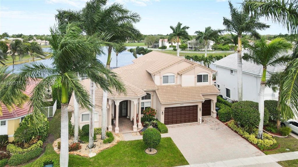 Photo of 11471 Paradise Cove Ln, Wellington, FL 33449 (MLS # A11923757)