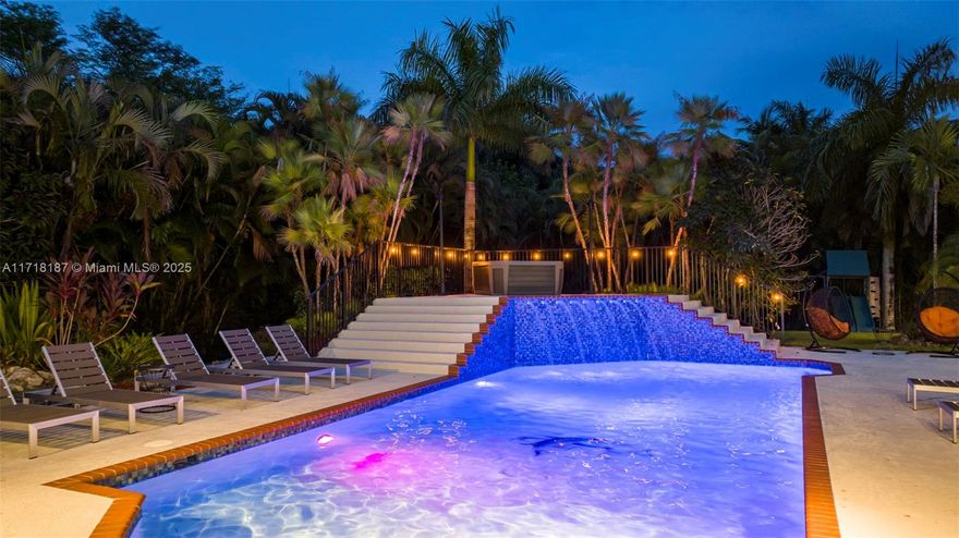 Welcome to your dream rental—a stunning, fully remodeled 7,000+ sq ft estate nestled on a private cul-de-sac in exclusive Davie. This luxurious 9-bedroom, 5-bath masterpiece offers a triple split floor plan, soaring ceilings, and a chef’s kitchen with a large island, breakfast bar, and oversized laundry room. The outdoor oasis is unparalleled, boasting a massive 17'x40' pool, multiple entertainment areas, and lush landscaping for complete privacy. Inside, enjoy a home theater, game room, and expansive living spaces designed for modern elegance. This is the ultimate rental for those seeking luxury, space, and tranquility.