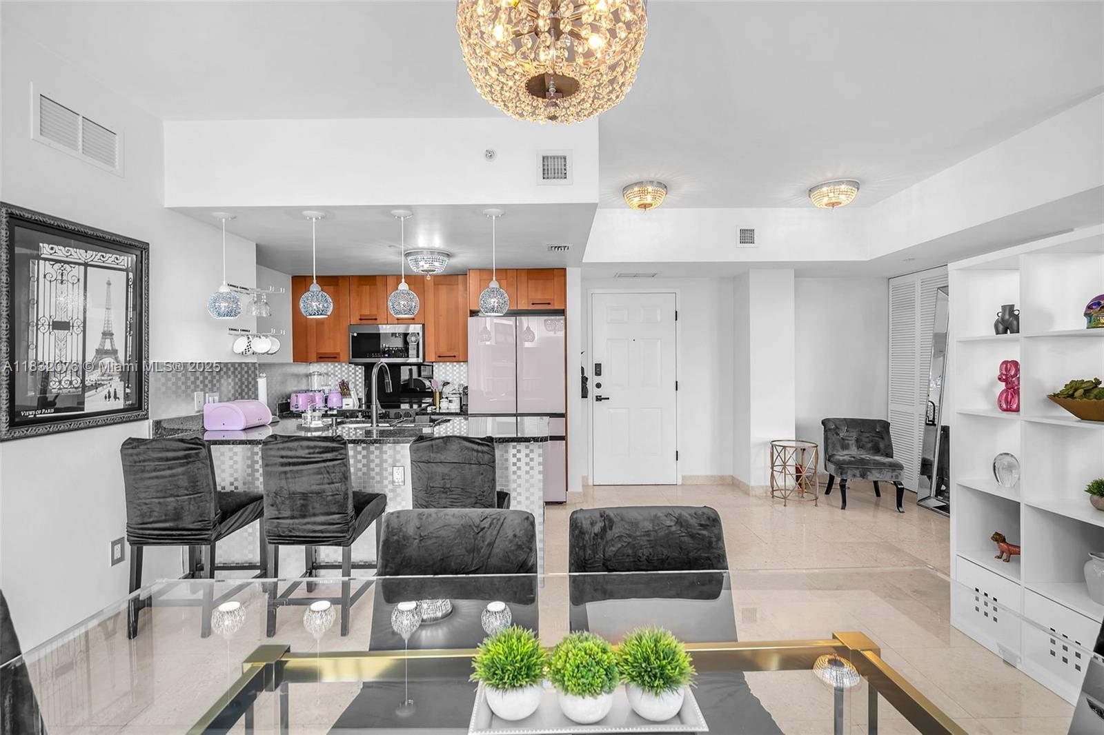 Live in luxury in this fully furnished 2-bedroom, 2-bath apartment on the 5th floor with lots of natural light and open city views. Move-in ready home includes brand new high-end appliances, custom closets, blackout blinds, ceramic tile flooring, and in-unit washer/dryer. Comes equipped with fresh and new bedding and towels. Rent includes water/sewer, and monthly professional cleaning as well. The spacious primary suite offers dual closets, plus large wall closet unit. Enjoy resort-style amenities: pool, fitness center, jogging path, rec room, 24/7 concierge and security. Pet-friendly with one assigned garage space and extra parking upon request. Unbeatable location—Merrick Park’s shops, dining, and cafés are just downstairs. Minutes to University of Miami, Miracle Mile, US-1, and more.