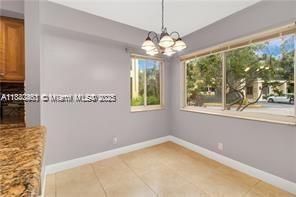 Corner unit Spacious Condo, 2 bedrooms and 2 bathrooms, Ceramic Floor, high ceilings, two balconies, ceiling fan outdoor. This unit is in great condition, with an upgraded kitchen, washer, and dryer. 1 parking space and a separate storage unit