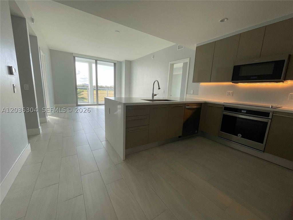 Photo of 2000 Metropica Way #307, Sunrise, FL 33323 (MLS # A12036304)