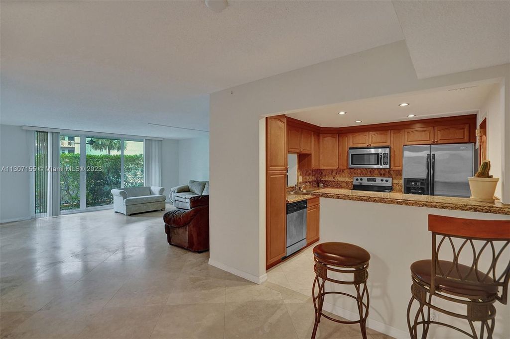 Photo of 401 NE 14th Ave #101, Hallandale Beach, FL 33009 (MLS # A11307155)