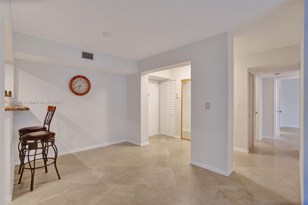 Photo of 401 NE 14th Ave #101, Hallandale Beach, FL 33009 (MLS # A11307155)