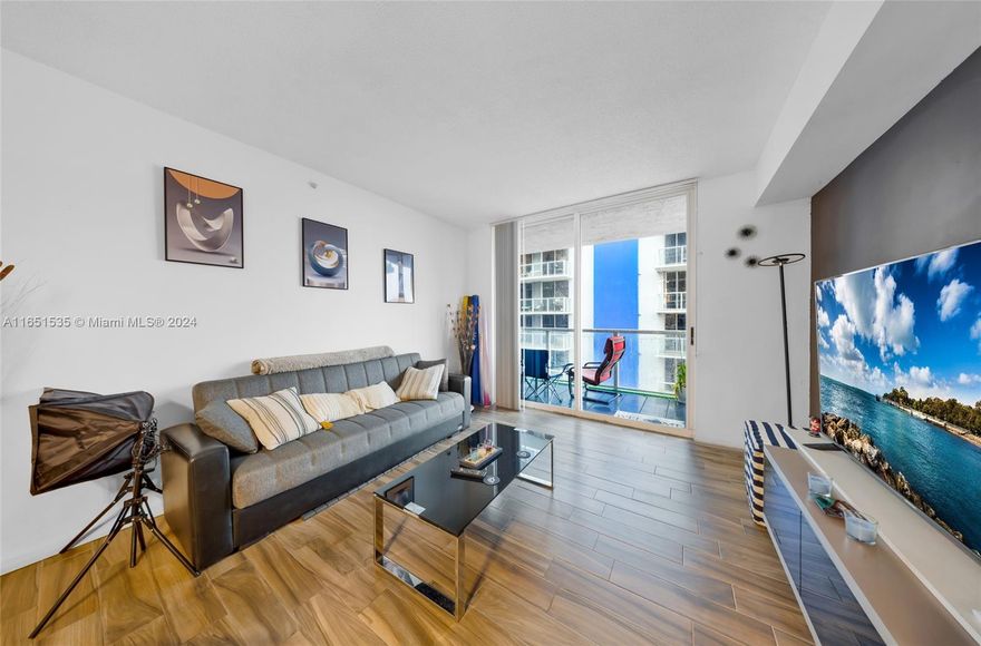 Spacious apartment with 2 bedrooms, 1 bathroom and 1 parking space on a higher floor. Porcelain tile floor throughout, Upgraded kitchen, Washer and Dryer inside the unit. The Blue Lagoon Condominiums has excellent location and spectacular amenities that include business center, heated pool, Jacuzzi, fitness center, grocery, spa/sauna, beauty salon, 7 BBQ in front of the lagoon, mini golf, kids play area, area for parties, Electric vehicle (EV) charging Station. Gated community conveniently located in Central Miami, close to Miami International Airport and highway access to Downtown and the beaches in minutes