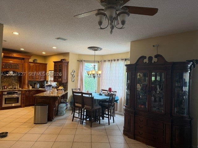 Photo of 1021 NW 185th Ave, Pembroke Pines, FL 33029 (MLS # A12094927)