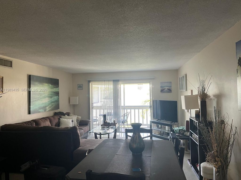 Photo of 322 N Federal Hwy #233, Deerfield Beach, FL 33441 (MLS # A11983435)