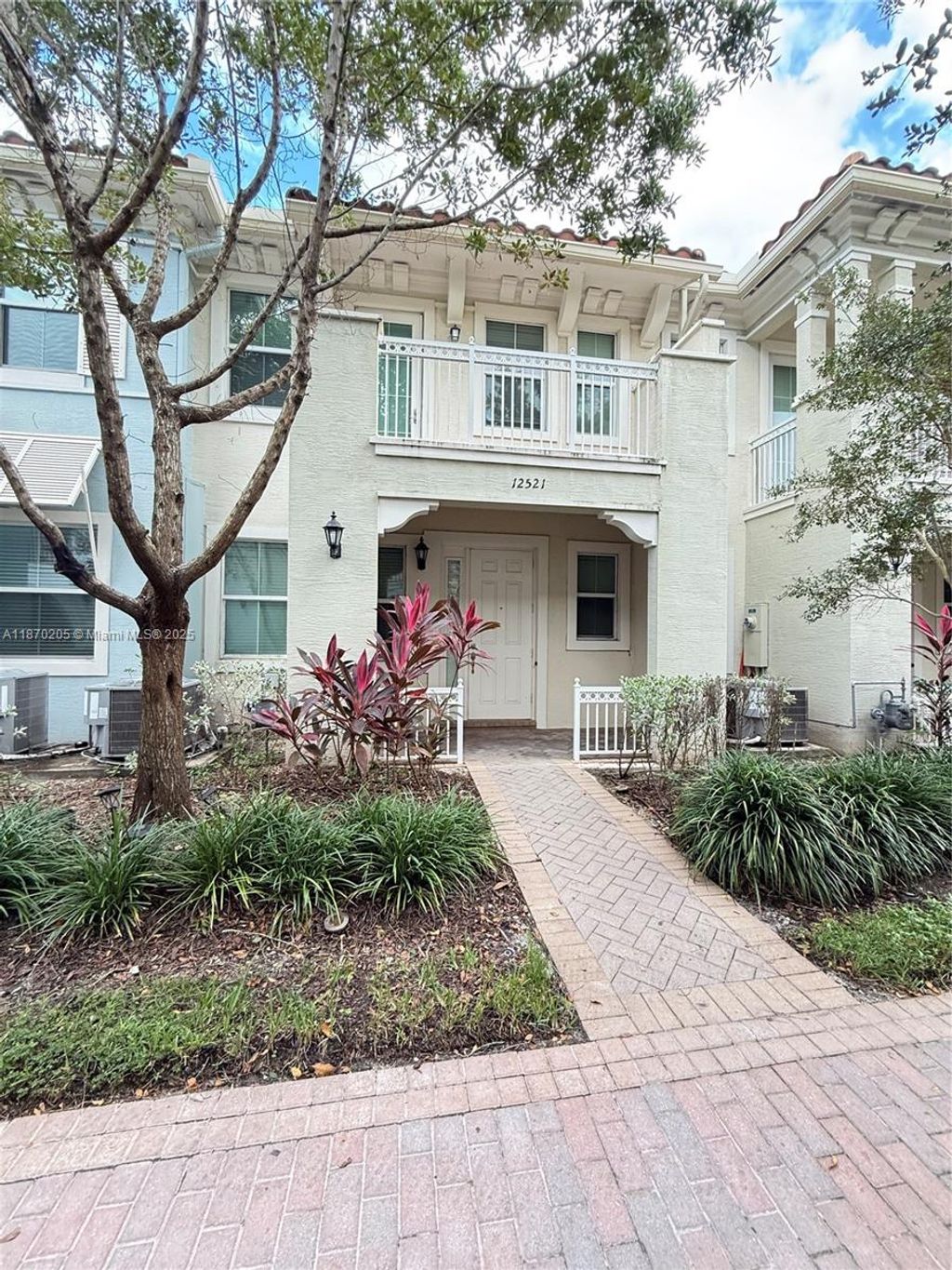 Photo of 12521 NW 32nd Mnr #175-3, Sunrise, FL 33323 (MLS # A11870205)