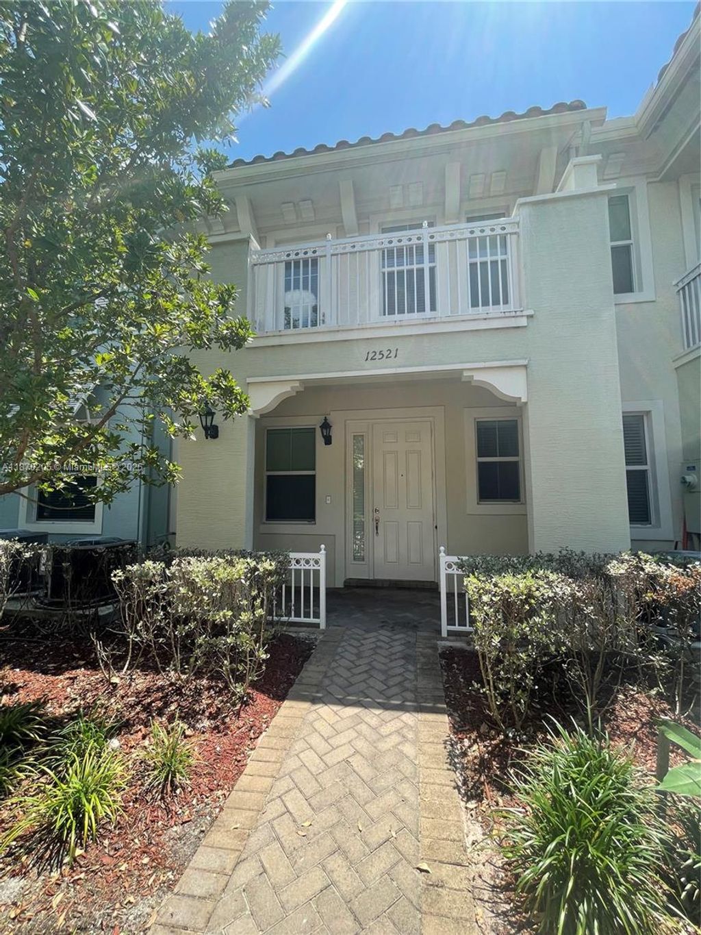 Photo of 12521 NW 32nd Mnr #175-3, Sunrise, FL 33323 (MLS # A11870205)